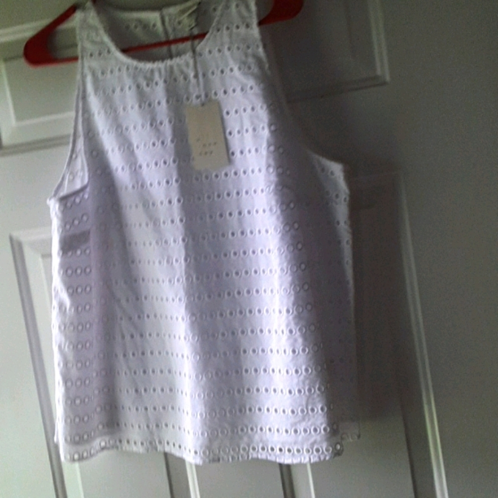 Sleeveless white top